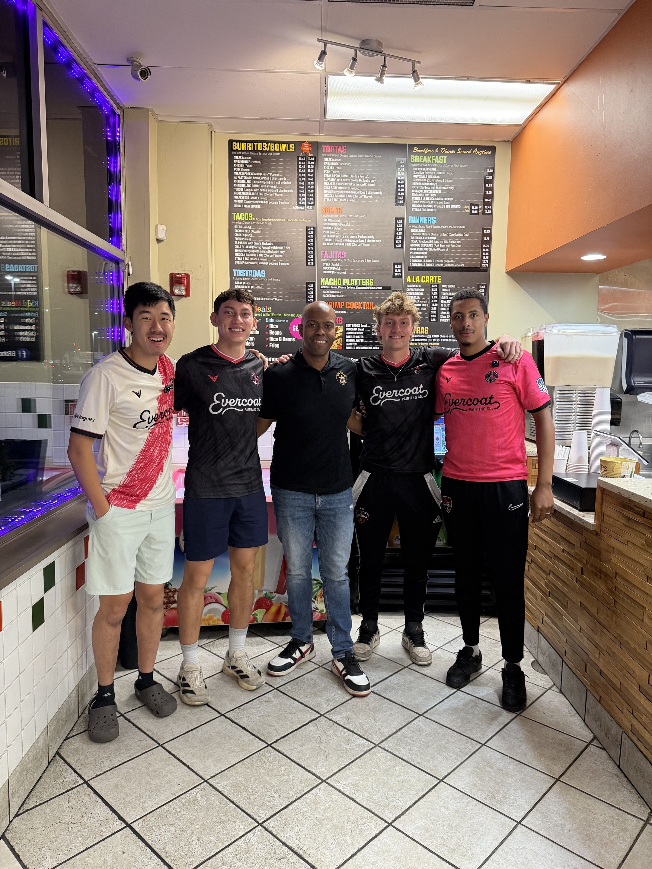 John Kadiman and Wheaton Wanderers players with the El Famous Burrito team